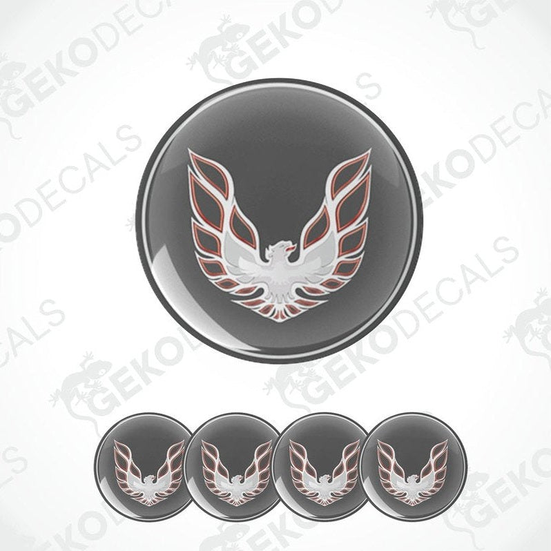 A set of four vinyl decals with a polyurethane coating featuring a white and red bird logo on a black background, designed for use on a PONTIAC FIREBIRD vehicle.