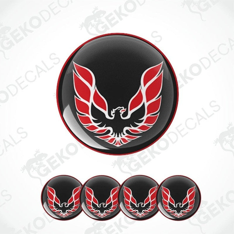 A set of four round vinyl stickers with a red and black Pontiac Firebird design.