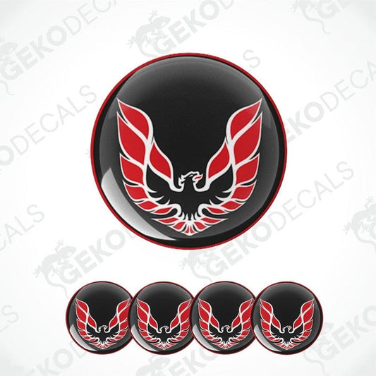 A set of four round vinyl stickers with a red and black Pontiac Firebird design.