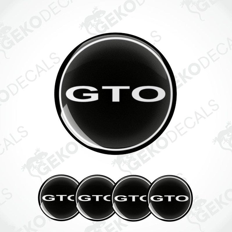 Set of four black vinyl decals with the 'GTO' logo in white, designed for use as car wheel caps.