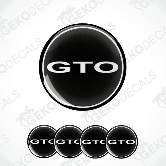 Set of four black vinyl decals with the 'GTO' logo in white, designed for use as car wheel caps.