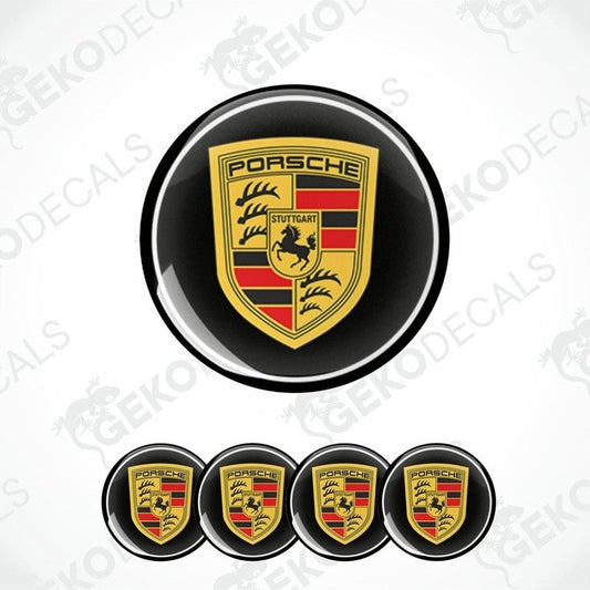 A set of four black vinyl stickers with the PORSCHE logo in the center, arranged in a stacked layout.