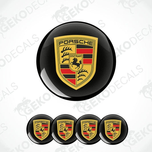 A set of four black vinyl stickers with the PORSCHE logo in the center, arranged in a stacked layout.