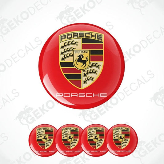 A set of four red vinyl stickers with a Porsche logo and the word 'Porsche' written on each sticker.