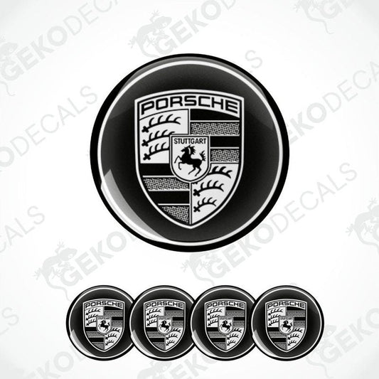 A set of four black vinyl stickers with a PORSCHE logo design, displayed against a white background.