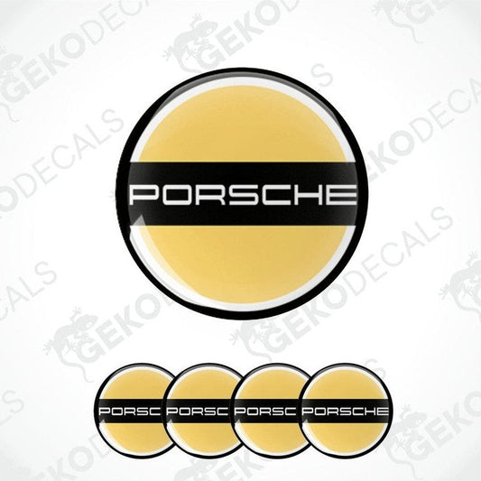 A set of four PORSCHE branded vinyl stickers with a yellow and black design and a polyurethane coating.