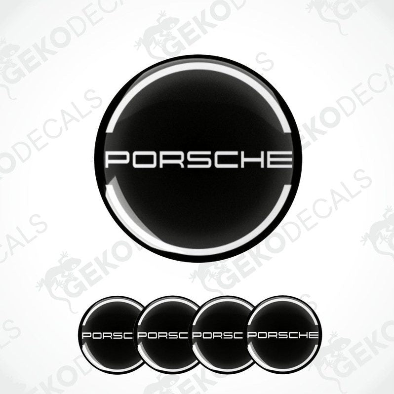 A set of four black vinyl stickers with the PORSCHE logo in white.