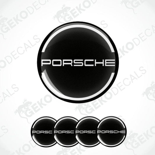 A set of four black vinyl stickers with the PORSCHE logo in white.