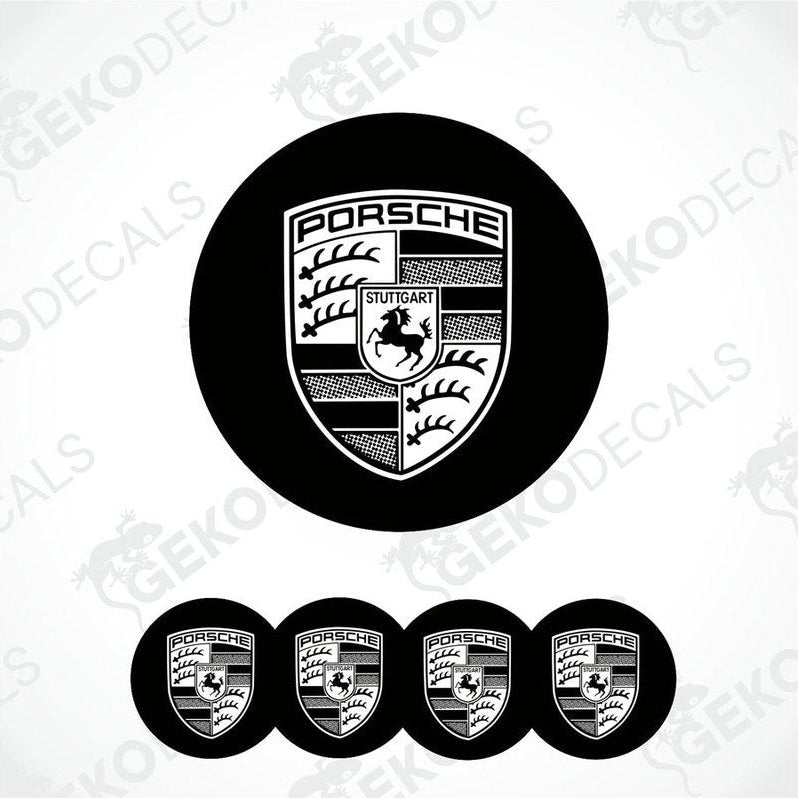 A set of black and white vinyl decals with the Porsche logo, including four dome-shaped stickers and one larger emblem.