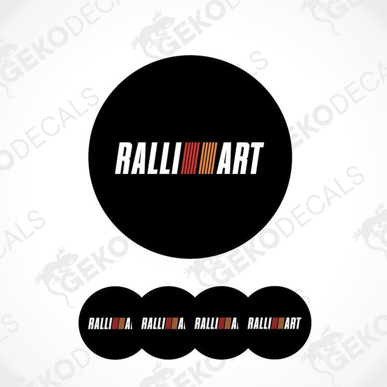 A set of four black vinyl stickers with the word 'RALLIART' and a geometric pattern in orange and red above the text.