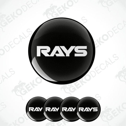 A set of black vinyl decals with the text 'RAYS' on them, typically used as car wheel caps.