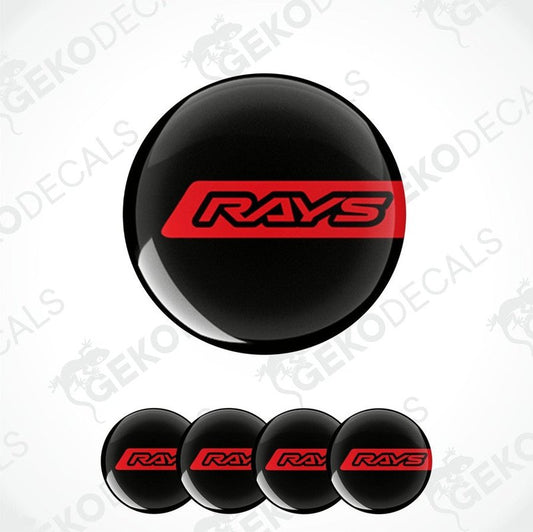 A set of four black vinyl stickers with the word 'RAYS' written in red and white.