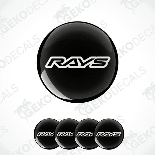 A set of four black vinyl stickers with the word 'RAYS' printed on them, placed against a white background.