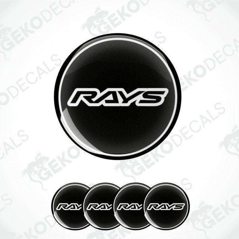 A set of four black vinyl stickers with the word 'RAYS' printed on them, placed against a white background.