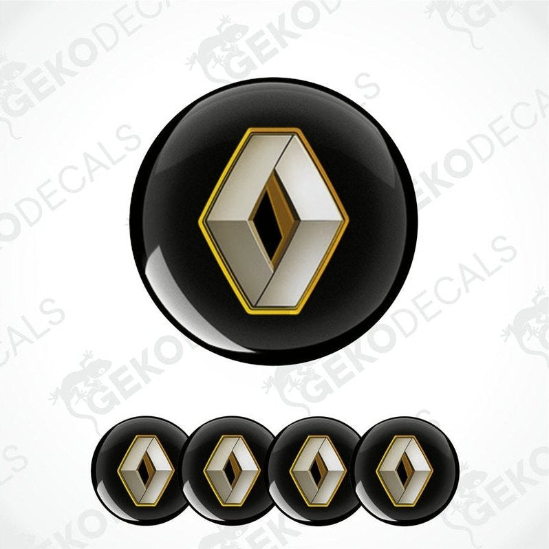 A set of four black and silver RENAULT branded vinyl stickers with a dome shape and a shiny finish.