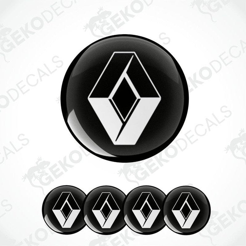 A set of four black vinyl stickers with a white geometric design, representing the RENAULT brand logo.