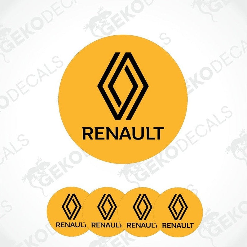 A set of four yellow vinyl decals with the RENAULT logo applied on a surface.
