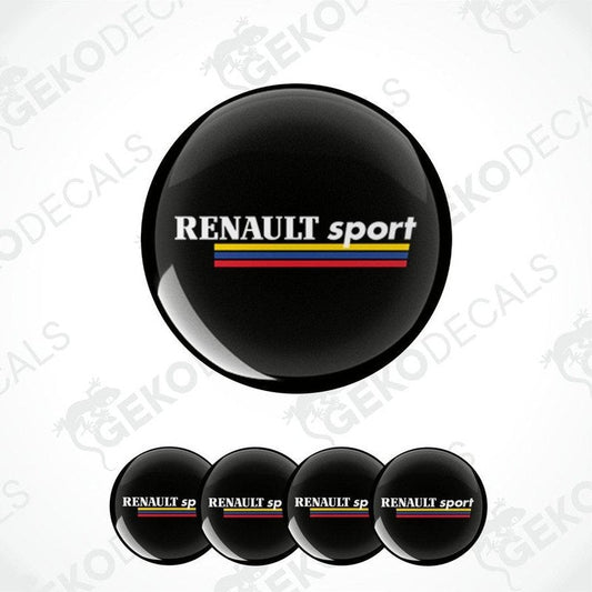 Set of four black round decals with the text 'RENAULT sport' in white, arranged in a row.