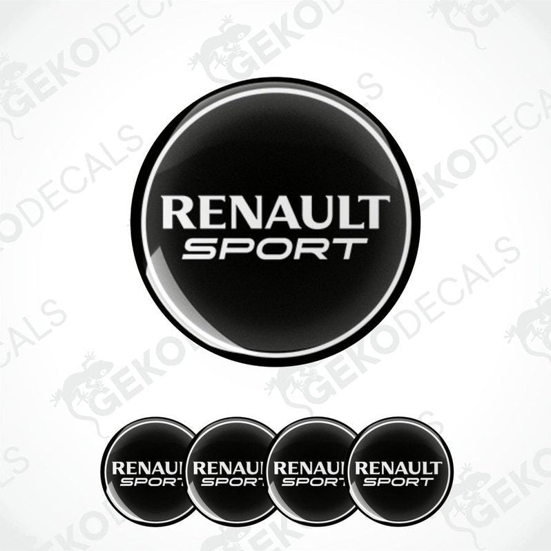 Set of four black round car decals with 'RENAULT SPORT' written in white letters.