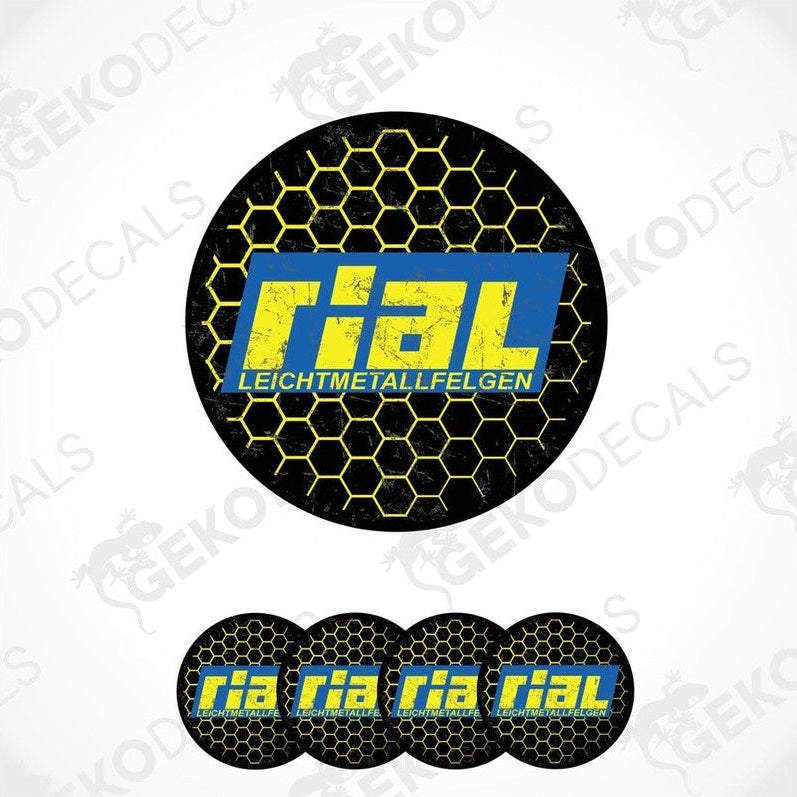 A set of four round vinyl stickers with a yellow and black design featuring the word 'RIAL' in bold letters, arranged on a white background.