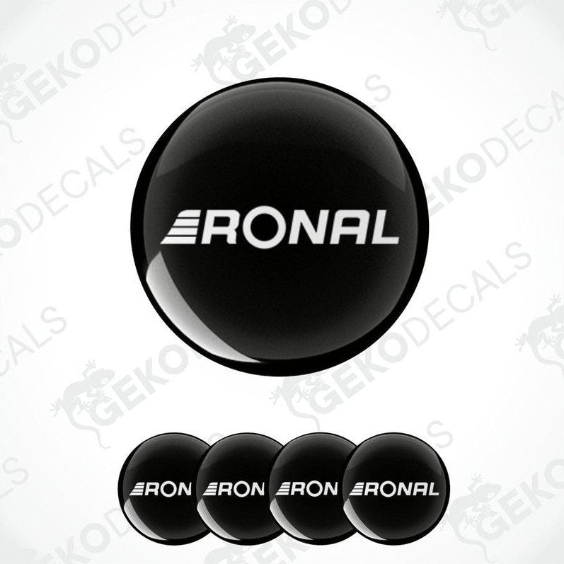 A set of four black vinyl decals with the RONAL logo, designed for use as car wheel caps.