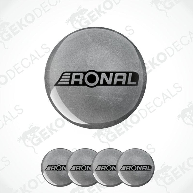 A set of four gray vinyl decals with the RONAL logo, designed for use as car wheel caps.