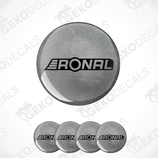 A set of four gray vinyl decals with the RONAL logo, designed for use as car wheel caps.