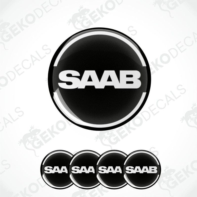 A set of four black and white vinyl stickers with the word 'SAAB' printed on them.