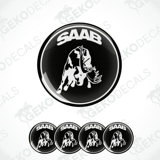 A set of black and white vinyl decals featuring a moose and the text 'SAAB'. The main decal is circular with the moose silhouette in white on a black background