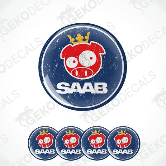 A set of round vehicle decals featuring a cartoon pig character with a crown and the SAAB car brand name.