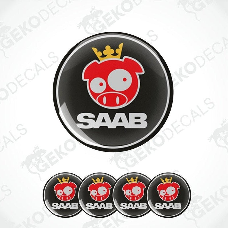 A set of four vinyl decals with a polyurethane coating, featuring a red and black pig design with the SAAB brand logo, intended for use on car wheel caps.