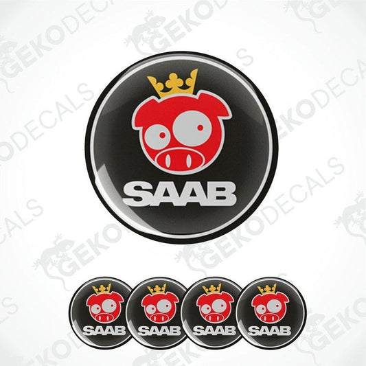 A set of four vinyl decals with a polyurethane coating, featuring a red and black pig design with the SAAB brand logo, intended for use on car wheel caps.