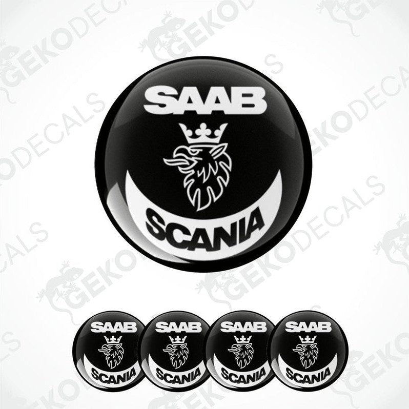 A set of black and white vinyl decals with the SAAB SCANIA logo, including one large decal and four smaller ones.