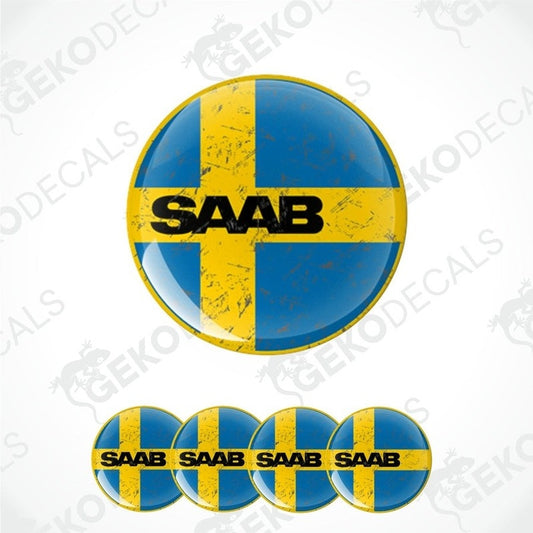 A set of four round car decals with a yellow and blue design, featuring the text 'SAAB' and the flag of Sweden.