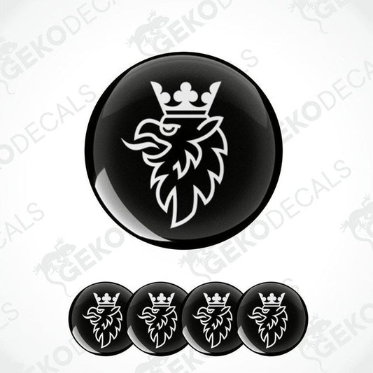 A set of four black vinyl stickers with a white logo of a scania and crown design.