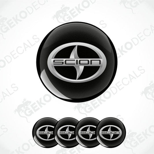 A set of four black and silver vinyl decals with the Scion logo.