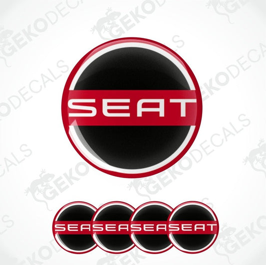 A set of black four red and white vinyl stickers with the logo 'SEAT' 