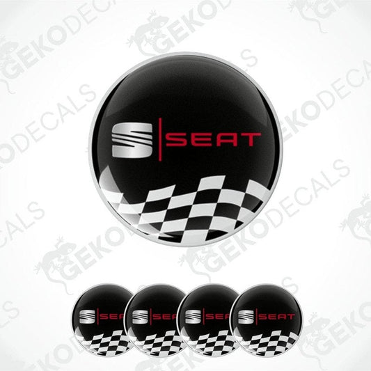 A set of four black vinyl stickers with a checkered pattern and the word 'SEAT' in red and white.