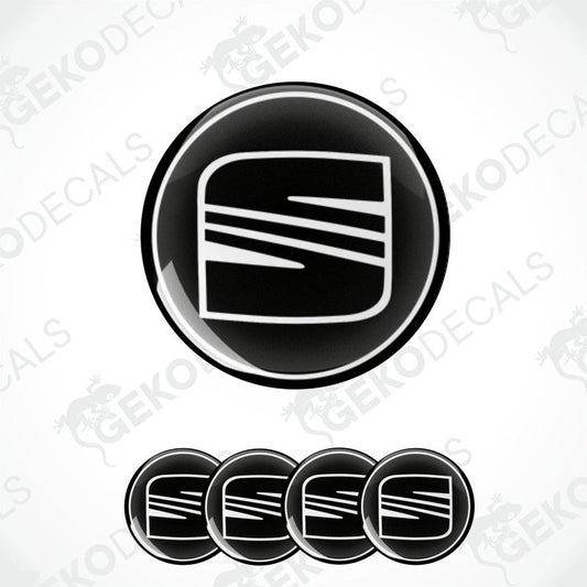 A set of four black and white vinyl stickers with a geometric design, including the word 'SEAT' on a white background.