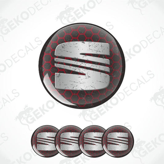 A set of four circular vinyl stickers with a red, black, and silver color scheme and the letter 'SEAT' in the center.
