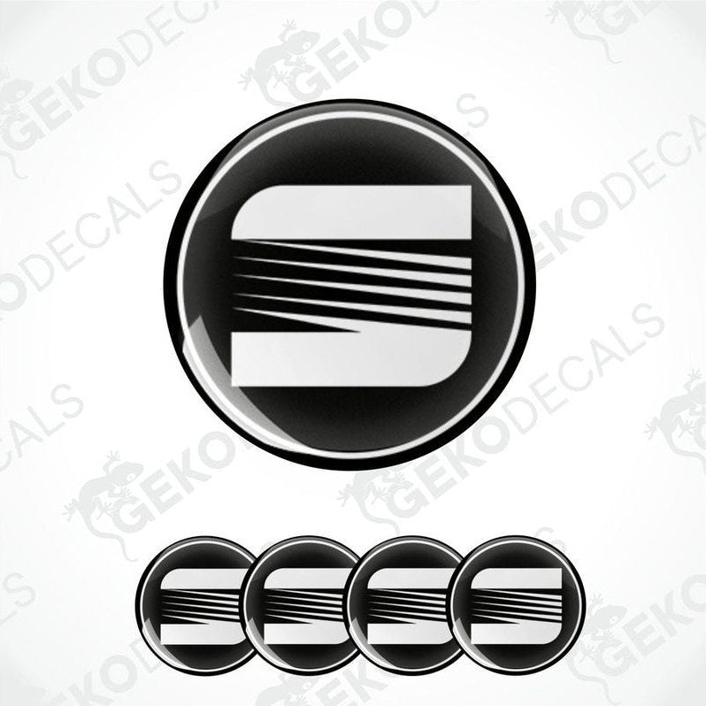 Set of four vinyl decals with polyurethane coating, featuring the SEAT logo in black and white.