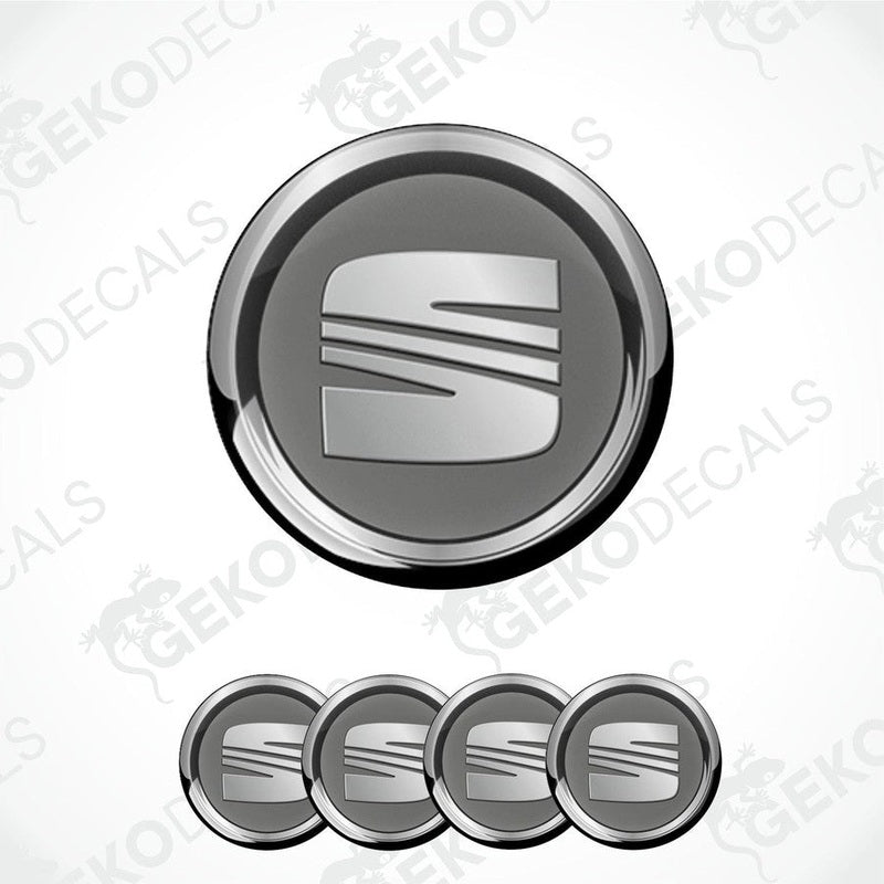 A set of round vinyl decals with a polyurethane coating featuring the SEAT logo in the center.