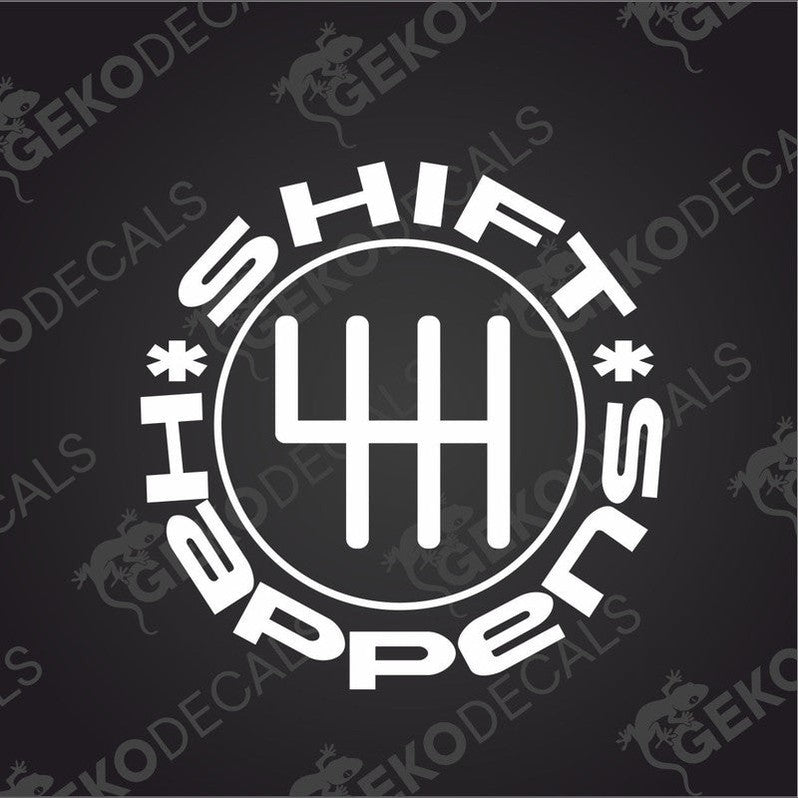 A black car decal with the text 'SHIFT HAPPENS' and a graphic of a hand indicating a change of gear.