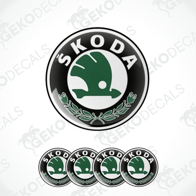 A set of four vinyl decals with a polyurethane coating featuring the SKODA logo in green and white on a black background.