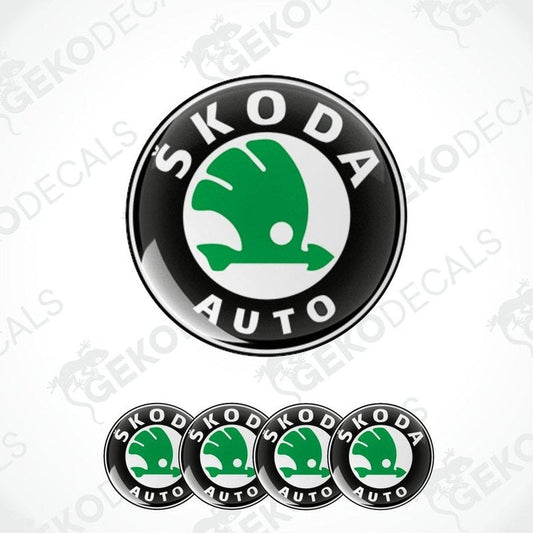 A set of four vinyl decals with a polyurethane coating featuring the SKODA AUTO logo in green and white on a black background.