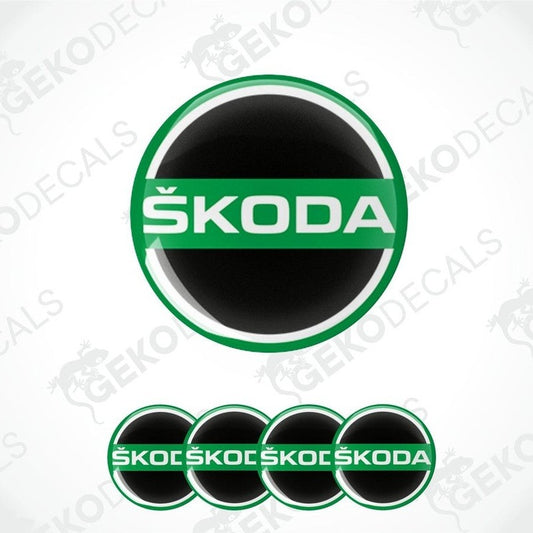 A set of four green, black, white, and red vinyl stickers with a ŠKODA logo design.