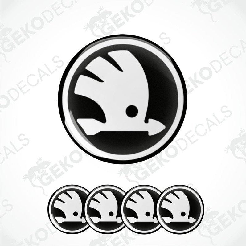 Set of four black and white vinyl stickers with the "SKODA" logo