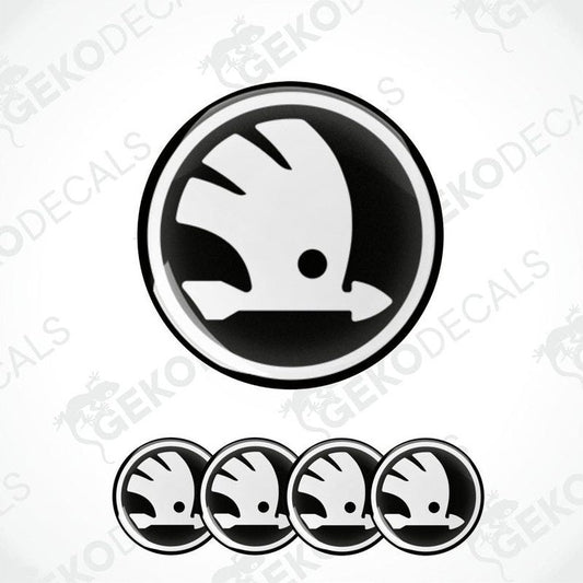 Set of four black and white vinyl stickers with the "SKODA" logo