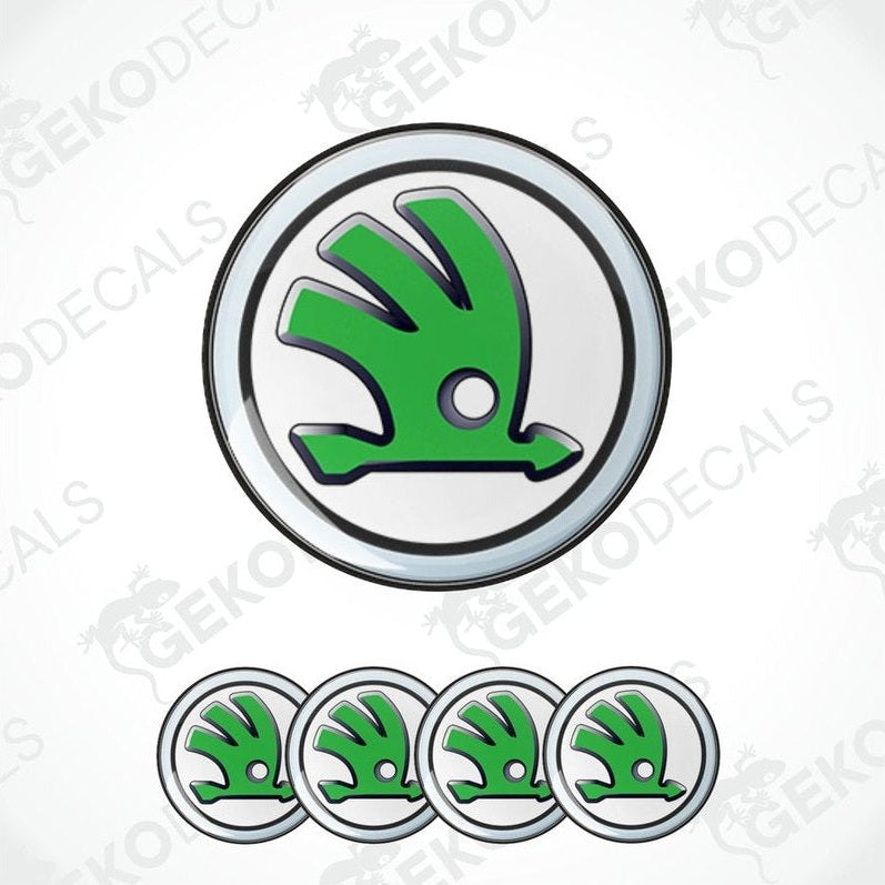 A set of four gwhite and green vinyl stickers with the logo'SKODA' 
