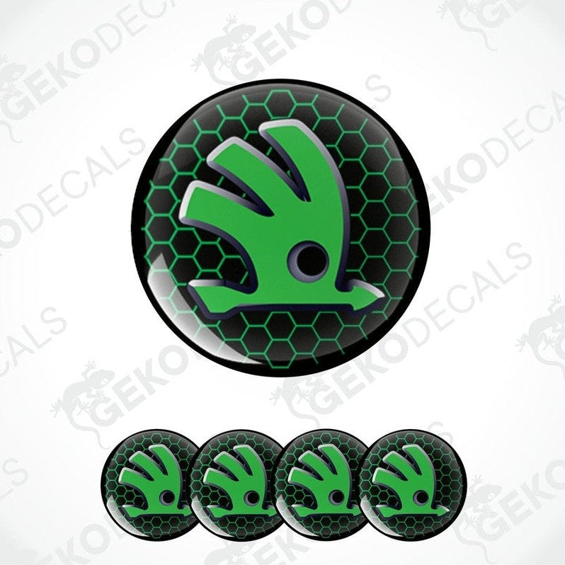 A set of four green and black vinyl stickers with the logo'SKODA' 